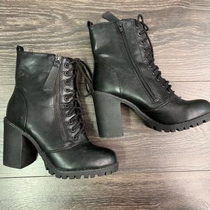 Black heeled combat boots